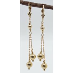 Elegant Jewelry With Dangling Beads, Elegant Dangling Beads Drop Earrings, Elegant Drop Earrings With Dangling Beads, Elegant Gold Earrings With Dangling Beads, Elegant Gold Chandelier Earrings With Dangling Beads, Classic Yellow Gold Chandelier Earrings, Elegant Jewelry With Dangling Charms, Elegant Long Drop Jewelry With Dangling Beads, Formal Long Drop Earrings With Dangling Beads