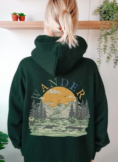 This super cute Wander travel inspired Hooded Sweatshirt is warm and cozy with no itchy side seams and is made from a blend of cotton and polyester.  Each Hoodie is original designed by SpeckleRabbit. Using a mixture of graphic elements and fonts she creates digital collages and optimizes each image for a crisp, clear, and vibrant print onto a variety of apparel. *Please ask any questions you may have before ordering. ~ITEM DETAILS~ * 50% Cotton 50% Polyester * Medium-heavy fabric (8.0 oz/yd² (271.25 g/m * Classic fit * Tear-Away label * Runs true to size ~HOODIE CARE~ *To clean your sweatshirt, machine wash on cold with like colors. Tumble dry low. Do not iron. Do not dry clean. *This item is printed on a Gildan 18000 crewneck with ink using a direct-to-garment printer by our production p Hooded Top For Winter Hiking, Hooded Winter Tops For Hiking, Casual Fleece Sweatshirt For Hiking, Hooded Winter Hiking Tops, Casual Fall Hoodie For Outdoor Activities, Casual Winter Hiking Tops, Fall Outdoor Sweatshirt With Kangaroo Pocket, Cozy Crew Neck Sweatshirt For Outdoor, Outdoor Graphic Print Fleece Sweatshirt