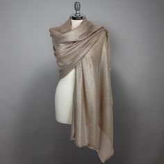 A very elegant viscose and silk mix shawl for your wedding party or evening dress. Made of a luxury viscose 60% and silk 40% mix.  Color: champagne gold (other colors are available) Size: 200 cm x 82 cm  You can use it as a wrap, shawl or stola. We have matching bags in our Etsy Shop! We accept credit cards! Champagne Shawl, Gold Scarf, Beige Silk, Color Champagne, Wrap Shawl, Silk Shawl, Gold Silk, Silk Wrap, Mix Color