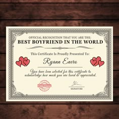 a certificate with two hearts on it, and the words best boyfriend in the world