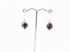 Amethyst Earrings // Oval Bali Setting // Silver Amethyst Earrings // Sterling Silver // February Birthstone Length: 1.3 inches Weight: 5 grams Stone: Amethyst Back side of the earring is ornately finished Hallmark 925 Note: please pay attention to the size and weight before purchasing. This is a very delicate and light weight earring. Handmade Oval Purple Earrings, Oval Amethyst Earrings For Gift, February Birthstone, Amethyst Earrings, February Birth Stone, Light Weight Earrings, Earrings Sterling Silver, Sterling Earrings, Pay Attention