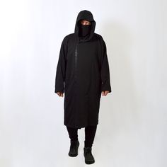 Very cool and comfortable unisex long hooded oversized coat with full zipper. Nice dense french terry fabric makes it cozy. It goes well with streetwear, gothic, punk, cyberpunk, militari, ninja, post-apocalyptic, jedi or sith styles, as easily as it fits in everyday wear. IMPORTANT! We can make a warmer version of the fabric with a fleece inside. If you want one, write to us. * 70% Cotton/ 30% Polyester. * Oversize. * Air-jet spun yarn with a soft feel and reduced pilling. * Strong overlock sea Oversized Techwear Outerwear With Adjustable Hood, Urban Oversized Parka For Streetwear, Urban Oversized Outerwear With Adjustable Hood, Oversized Techwear Jacket With Detachable Hood, Oversized Parka With Detachable Hood For Streetwear, Oversized Cotton Techwear Outerwear, Oversized Outerwear Hoodie With Detachable Hood, Oversized Hooded Parka For Streetwear, Oversized Parka With Drawstring Hood For Streetwear