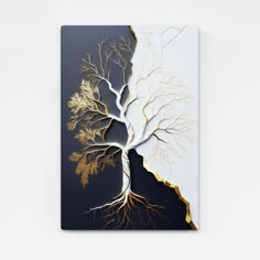 a piece of art that looks like a tree with gold and white leaves on it