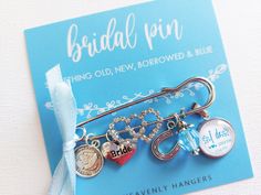 a brochure with some charms attached to it's side and the words bridal pin on it