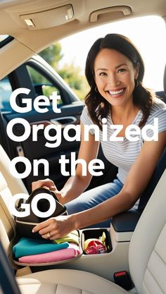 a woman sitting in the back seat of a car holding a purse and smiling at the camera