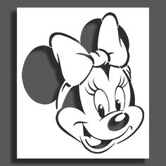 a minnie mouse face with a bow on it's head, in black and white