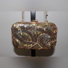 Lulu Nyc Embellished Copper And Gold Sequin Silk Hard Case Crossbody Clutch This Purse Is 7" X 4" X 2". It Is In Excellent Condition All The Sequence Are Intact. A Very Beautiful Purse With Sequin In Copper, Gold And Silver. Rectangular Glitter Clutch For Night Out, Glamorous Multicolor Bags For Formal Occasions, Formal Rectangular Bags With Sequins, Formal Sequined Rectangular Bags, Formal Rectangular Sequin Bag, Rectangular Sequined Party Clutch, Glamorous Rectangular Festive Bag, Rectangular Sequin Party Clutch, Sequined Rectangular Clutch For Events