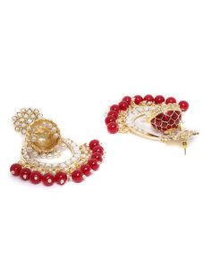 These beautiful maroon (deep red) dome shaped jhumka earrings come with kundan stone studs & beads, are gold-plated and are secured with a post and back closure. These handcrafted jhumkas can be paired with any traditional outfit to add a punch of colorful boost, and help you stand out. Product color may vary based on the monitor or screen you are using.See FAQ for more details. Size Length: 9.5 cm Details Material: BrassStones: Kundan & Artificial BeadsPlating: Gold-plated Ruby Meenakari Jhumkas For Festivals, Bollywood Style Ruby Chandbali Jhumkas, Bollywood Style Red Ruby Earrings, Heavy Ruby Jhumkas For Festive Occasions, Ruby Meenakari Jhumkas Temple Jewelry, Festive Heavy Ruby Jhumkas, Ruby Meenakari Jhumkas For Gift, Ruby Meenakari Temple Jewelry Jhumkas, Heavy Ruby Traditional Jhumkas