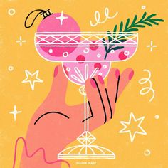 a hand holding a pink cocktail in front of a yellow background with stars and confetti