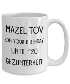 a white coffee mug that says mazel tov on your birthday until 120 geunterheit