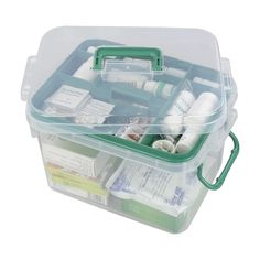 two plastic containers filled with medical supplies