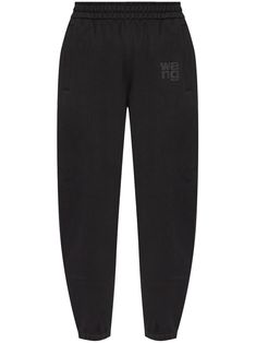 black cotton jersey texture elasticated waistband appliqué logo slip pockets to the sides tapered leg elasticated cuffs Yoko London, Summer Beach Wear, T By Alexander Wang, Shirt Skirt, Casual Elegance, Sport Pants, Active Wear For Women, Alexander Wang, Track Pants