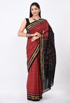 *Presenting this elegant and classy Saree exclusively from Craftnirmit. Made from luxurious fine cotton, the sari is woven within the traditional Ikat Orissa weaver by hand giving an exotic look to the saree. And this saree comes with geometric Patterns. It is further designed with a contrast striped Pallu and temple border that gives the vibrant and classic traditional look. Feel stunning & and style in this traditional ikat saree from Craftnirmit. This saree can be paired with an elegant pair Black Pre-draped Saree With Zari Weaving For Puja, Bollywood Style Black Handloom Dupatta, Festive Handloom Black Saree, Festive Black Handloom Saree, Elegant Black Chanderi Handloom Saree, Black Cotton Silk Saree, Black Bollywood Handloom Saree, Bollywood Style Black Handloom Saree, Black Traditional Wear With Woven Motifs For Festivals