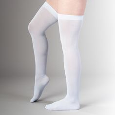 American Duchess' exclusive silk stockings are perfect for historical and vintage ensembles. These soft and opaque stockings are designed with extra stretch for a comfortable fit, and they reach up to mid-thigh on most. Secure your silk stockings with suspension garters, roll garters, or decorative garters of your choice. Care instructions: Hand wash. Line dry. Do not bleach. Sizing One size fits many. Model 1 is 5'9" and wears a US dress size 18 Model 2 is 5'8" and wears a US dress size 6 Mater Fitted Classic Thigh High Hosiery, Classic Fitted Thigh High Hosiery, Classic Fitted Thigh-high Hosiery, Elegant Thigh-high Compression Stockings, Elegant Thigh High Compression Stockings, Elegant Compression Thigh High Stockings, Classic Fitted Knee-high Stockings, Classic Knee-high Fitted Stockings, Classic Thigh High Tight Legwear