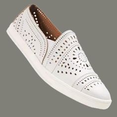 American Rag Casual Round Toe Slip-On Sneakers In White With White Rim. Perforated Pattern On Top And Sides For Breathable All Day Wear. Elastic Bands At Sides For Ease To Slip-On And A Secure Fit. Brand New With Box - Never Worn. Woman's Size 8m. White Flat Heel Slip-on Sneakers, White Slip-ons With Perforations, Casual Slip-on Sneakers With Vented Sides, White Flat Sneakers With Perforations, White Leather Slip-on Sneakers For Spring, White Slip-ons With Perforated Toe Box, White Slip-on Sneakers With Perforations For Spring, Casual White Slip-ons With Perforated Toe Box, White Synthetic Slip-ons With Perforated Toe Box