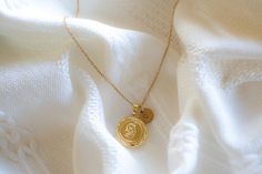 This locket necklace features a charming flower design and a flat circular shape. It serves as a keepsake for your most treasured memories, allowing you to insert a photo within it. Talk about a perfect gift idea! * How To Order 1. Choose the size. 2. Select initials, if you do not want any initial, select "NONE" (UPPER CASE and HEART Shape Available) if you want LOWERCASE please message me BEFORE placing the order!) 3. Add to cart and submit order :) * Locket : Photo Frame Pendant, Flat Round w Initial Pendant Locket Necklace With Charms As Gift, Mother's Day Charms Locket Necklace With Round Pendant, Round Pendant Locket Necklace With Charms For Mother's Day, Personalized Gold Locket Necklace For Birthday, Gift Vintage Charm Initial Pendant Necklaces, Mother's Day Round Pendant Locket Necklace With Charms, Gift Vintage Charm Initial Pendant Necklace, Vintage Charm Necklace For Mother's Day, Personalized Medallion Locket Necklace For Gift