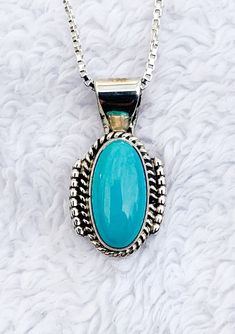 This is a flawless turquoise and sterling silver. Very pretty pendant accented with twisted wire. Elegant Turquoise Necklace With Oval Pendant, Nickel-free Elegant Turquoise Necklace, Elegant Turquoise Sterling Silver Necklace, Sterling Silver Turquoise Necklace With Large Pendant, Silver Turquoise Necklace Stamped 925, Pretty Pendant, Twisted Wire, Sterling Silver Pendants, Silver Pendant