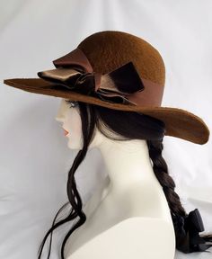 "ONE OF A KIND" Hand blocked mousseline millinery felt hat in fabulous boho style! Dramatic warm brown color and a texture that is so luscious and soft. It has a longer nap than most velour felts.  Oval crown with a bit of a bowler shape to it. Decorated with stunning vintage velvet ribbon that was Made in France. Lovely 4" sweeping brim.   Head size is 22"-22.5" Ships FREE UPS ground. This is a 25.00 savings! Brown Wool Felt Hat For Kentucky Derby, Vintage Fitted Felt Hat For Fall, Kentucky Derby Fur Felt Cloche Hat With Flat Brim, Fitted Brown Felt Hat, Retro Curved Brim Felt Hat For Winter, Brown Short Brim Felt Hat For Kentucky Derby, Retro Fitted Brimmed Felt Hat, Vintage Fur Felt Fedora For Fall, Fur Felt Boater Hat For Kentucky Derby