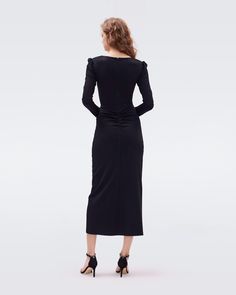 A classic little black dress, the Hughie midi is cut from a soft jersey. This piece has long sleeves, slightly puffed shoulders, a subtle sweetheart neckline, and flattering ruching that gathers at the hip. LENZING™ ECOVERO™ Viscose fibers are created from renewable wood sources and manufactured using less water and emitting less CO2. Better for the environment, better for your style.Yana is 5 Foot and 8 Inches and wearing a size XS. Wrap Dress Dvf, Classic Little Black Dress, Midi Wrap Dress, Wrap Dress Floral, Mini Wrap Dress, Maxi Wrap Dress, Knee Length Dresses, Linen Dresses, Sweetheart Neckline