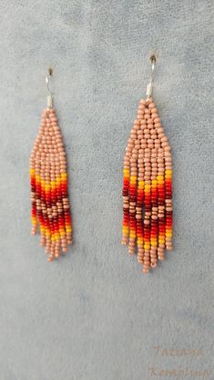 These handmade earrings are made of high-quality Czech beads and strong synthetic thread. They are elegant, fashionable, and highly versatile, suitable for everyday wear. There may be some color discrepancies which is due to the different monitor settings 100% hand made with love! Measurements: Length-about 7cm (2.8 inch) Width -about 1. 8 cm (0.7 inch) Materials: Sterling silver components Czech glass beads Strong bead weaving thread Beige Tassel Dangle Earrings, Beige Dangle Jewelry With Colorful Beads, Beige Beaded Earrings With Dangling Beads As Gift, Beige Beaded Earrings With Dangling Beads For Gift, Beige Dangle Earrings With Ear Wire, Handmade Beige Dangle Beaded Earrings, Chandelier Boho, Ombre Earrings, Earrings Native American