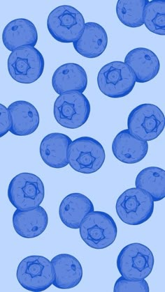 blueberries are shown on a blue background