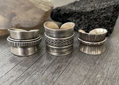 You can choose between 6 unique sterling silver chunky rings, each made with a unique design and some have stamped details, some have braided details. Each ring can be perfect for your day by day outfits. In the pictures you will see a number that represents each ring for you to choose from. Ring #1- An open band ring that is size adjustable, the bigger the size the bigger the gap that will open on the back of the ring. The smallest size available is 7.25. Ring #2- A hand stamped square silver r Handmade Adjustable Wide Band Stackable Rings, Handmade Thick Band Jewelry For Everyday, Handmade Jewelry With Thick Band For Everyday, Unique Handmade Wide Band Round Ring, Handmade Unique Rings With Thick Band, Unique Handmade Rings With Thick Band, Handmade Bohemian Wide Band Ring For Anniversary, Unique Stamped 925 Thick Band Jewelry, Bohemian Hand Cast Silver Rings