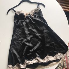 Never Worn Black Satin And Tan Lace Nightie Small. Built In Wire Bra Black Satin Sleepwear With Lace Trim, Black Coquette Nightgown For Sleep, Black Coquette Nightgown For Party, Coquette Black Nightgown For Sleep, Coquette Black Nightgown For Party, Elegant Black Nightgown For Bedtime, Black Satin Nightgown For Wedding Night, Black Coquette Nightgown For Bedtime, Black Coquette Sleepwear For Wedding Night