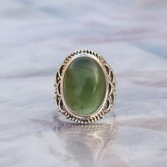 NOTE : WE USED NATURAL GEMSTONES , SO STONE  MAY BE LITTLE DIFFERENT .This  is a listing  of Boho sterling silver ring # metal = sterling silver  925 # Gemstone  - Green Jade# Ring Size - Available in all Size # Stone Color - Green# Stone Shape - OvalHandmade Crafting bohemian Ring - This style has bohemian style . it will look beautiful when you wear it ..Thanks for visiting our shop ...  favorite our shop for daily updates ... Bohemian Oval Crystal Ring Nickel Free, Bohemian Style Oval Crystal Ring Nickel Free, Bohemian Oval Crystal Ring Nickel-free, Bohemian Oval Cabochon Ring, Bohemian Round Crystal Ring For Jewelry Making, Handmade Bohemian Oval Crystal Ring, Bohemian Handmade Oval Crystal Ring, Bohemian Nickel-free Crystal Ring As Gift, Bohemian Nickel-free Crystal Ring Gift