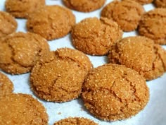 a bunch of cookies that are on a paper towel