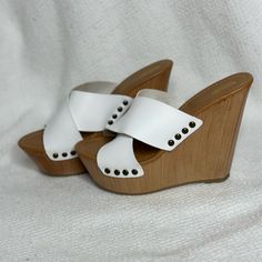 Fun Summer White Wedges-Never Worn White Wedge Sandals With 4-inch Heel For Summer, White High Heel Platform Wedge Sandals, Trendy White Wedge Sandals, Trendy White Leather Wedge Sandals, Trendy White Wedge Heels, Chic White Heels With Wooden Heel, White Wedge Sandals With 4-inch Heel For Spring, White Wedge Sandals With Removable Insole, White Open Toe Wedge Sandals With Wooden Heel