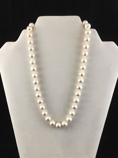 "The luster on the 10-11 white freshwater cultured pearls are amazing! This strand measures 18\" and are knotted between each bead which are attached to a 14k white gold clasp." Classic Pearl Necklace With Polished Beads, Formal Pearl Necklace With Polished Beads, White Akoya Pearl Necklace With Sterling Silver Clasp, White Polished Pearl Necklace For Formal Occasions, Akoya Pearl Necklace With Sterling Silver Clasp, Classic Polished Beads Pearl Necklace, Classic Round Pearl Necklace With Polished Beads, Pearl White Necklace With Sterling Silver Clasp, Formal Polished Pearl Necklace