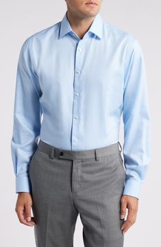 A solid hue brings versatility to a handsome dress shirt made from convenient non-iron cotton oxford cloth in a traditional fit. 33 1/2" length; 53" chest length (size 18) French placket Spread collar Rounded, adjustable button cuffs 100% cotton Machine wash, tumble dry Imported Dress Shirt, Most Beautiful, Oxford, Blue And White, Nordstrom, Bring It On, Collar, Blue, Clothes