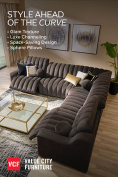 a living room filled with lots of furniture on top of a hard wood floored floor