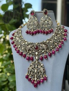 Kundanjewelsbyshiv Indian Ethnic Polki Kundan 22 Carat Gold Plated Pink And Purple Necklace Set * This Set Is made up with High Quality Uncut Polki Kundan *  Gold Plating Is used * High Quality Beads Are used * Set includes  Necklace and earrings Beads Color  (Pink and Purple Color) Can be customized according to your requirements. We made Jewelry in pachi kundan /Ahemdabadi kundan and made designs on order only , need at least 25 days to make ,to do customization as they are acceptable. jewellery details :All jewellery are made with silver base and luxury gold plated next to real,generally we work on direct made on order.   We are  the dealers of Authentic and traditional Indian Jewelry  We  are honored to present you our elegant, stylish and unique designs with a  wide range of items in Purple Necklace Set, Indian Bridal Necklace, Elephant Shape, Earrings Beads, Traditional Indian Jewellery, Gold Bridal Jewellery Sets, Jewelry Roll, 22 Carat Gold, Indian Necklace