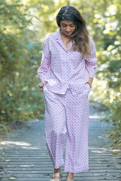 There is a lot to love about these chequered pyjama set,if you are fan of Japanese design then these pjs will not disappoint you! Made with the softest organic cotton. The arm and leg length is shorter than more conventional pjs but they look fabulous and quirky. The top has a boxy body with 3/4 wider sleeves and trousers are cropped slightly above the ankle length. Organic cotton is so soft and is known for its breathable and lightweight quality keeps you cool in summer and toasty in winter Features  - Pure soft cotton  - Vegan product  - Lightweight and breathable  - Elastic waist with drawstring  - Button closure  - Straight full length trousers  - Gorgeous print available in two colours  - Generously sized for comfort  - Washes and dries quickly  - Ethically made in India - Machine was Cotton Sleep Sets With Long Pants, Cotton Sleepwear Long Pants For Spring, Comfortable Matching Sleepwear Set For Spring, Comfortable Matching Set Sleepwear For Spring, Comfortable Relaxed Fit Pajama Party Sets, Summer Bedtime Sets With Long Pants, Cotton Sleepwear For Summer, Casual Cotton Matching Sleepwear Set, Summer Cotton Sets With Long Pants