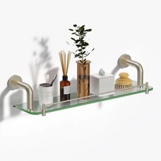 a bathroom shelf with soap, toothbrushes and other items