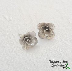 "Delicate Flower Earrings. Sterling silver stud Earrings.Silver Flower Earrings. Silver Earrings. Silver Flowers Stud. Floral Earrrings. Minimalist Jewelry. Bridesmaid Gift. Floral Jewelry. Handmade dainty Flower Earrings in sterling silver. Nature Flowers are one of my treasures and I never tire of creating these minimalist stud earrings. Details: Weight: 2.3 g each one Width: 11 mm = 0.43\" ... Designed and produced entirely by hand by me ... Enjoy and thanks for looking Follow me: www.faceboo Silver Flower Earrings For Mother's Day, Nickel Free Flower Earrings For Anniversary, Nickel-free Flower Earrings For Anniversary, Silver Flower Earrings For Mother's Day Anniversary, Delicate Silver Flower Earrings For Anniversary, Mother's Day Silver Sterling Flower Earrings, Silver Flower Shaped Earrings For Anniversary, Silver Flower Earrings With 3d Flowers For Gift, Silver Flower Earrings With 3d Flowers As Gift