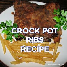 a white plate topped with meat and french fries