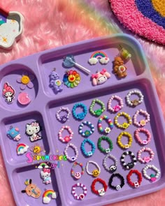 a purple tray filled with lots of beads