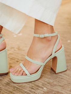 Spring Strappy Heels With Stacked Heel, Strappy Heels With Stacked Heel For Spring, Spring Sandals With Ankle Strap And Wrapped Heel, Spring Vacation Sandals With Heel Loop, Strappy Sandals For Spring Brunch, Chic Strappy Heels For Spring, Spring Strappy Heels For Day Out, Trendy Spring Sandals With Wrapped Heel, Summer Sandals With Stacked Heel And Ankle Strap