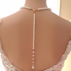 Separable Backdrop Pearl Necklace in Rose Gold, wear it with or Without the Backdrop The jewelry you use on your wedding day should be worn again and again. Sometimes with a backdrop necklace, it may not be the best suited to wear a backdrop necklace with your formal or occasion outfits. That's why we have created a pearl necklace with a separable backdrop. Wear your wedding necklace with or without a backdrop to perfectly suit your style on every occasion with every outfit. This beautiful rose Elegant Single Strand Bridal Necklace For Wedding, Elegant Pearl Backdrop Necklace With Pearl Drop, Adjustable Pearl Embellished Bridal Necklace For Wedding, Adjustable Pearl Drop Bridal Necklace For Formal Events, Elegant Single Strand Necklace For Wedding, Pearl Bridal Necklace For Wedding, Elegant Pearl Bridal Necklace For Wedding, Single Strand Pearl Necklace For Wedding, Elegant Pearl White Backdrop Necklace With Pearl Drop