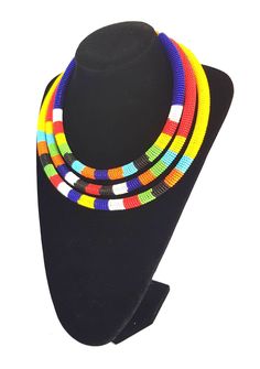 Perfect piece to add to your jewelry set! 100% handcrafted using original fine beads. The longest strand is 20 inches, middle strand 18 inches and the shortest is 16 inches. **Buy multiple items and pay shipping for 1 item only.The rest ships free. **This necklace ships via dhl express. More neckleces here; https://www.etsy.com/shop/TribalTess?ref=seller-platform-mcnav&section_id=21306083 Back to my shop; https://www.etsy.com/shop/TribalTess?ref=seller-platform-mcnav Adjustable Multicolor Beaded Layered Necklace, Handmade Unique Double Strand Beaded Necklaces, Unique Handmade Double Strand Beaded Necklaces, Multicolor Beaded Choker, Bohemian Multicolor Layered Necklace For Gift, Multicolor Polished Beads Choker Jewelry, Multicolor Polished Bead Choker Jewelry, Multicolor Polished Beads Choker, Multicolor Polished Bead Choker