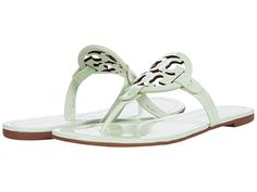 Tory Burch Miller Sandal - Women's Shoes : Meadow Mist : Your style shines through with the Tory Burch Miller sandal. Leather upper features an allover botanical print. Slip-on design. Open-toe silhouette with thong post. Signature brand logo cut-out at instep. Smooth leather lining. Lightly padded footbed lends to added comfort. Textured man-made outsole. Made in Brazil. Measurements: Heel Height: 1 2 in Weight: 5 oz Product measurements were taken using size 8, width M. Please note that measur Designer Open Toe Flip Flops For Spring, Designer Flip Flops For Summer Vacation, Designer Flip Flops For Spring Beach Season, Designer Flip Flops For Beach In Spring, Designer Summer Flip Flops For Vacation, Designer Flip Flops For Summer, Miller Sandal, Tory Burch Miller, Tory Burch Miller Sandal