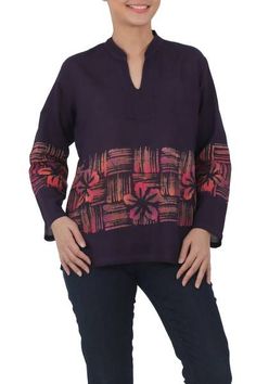 Made from 100% cotton voile this exotic blouse features a hand-painted batik design by Chomsuda Samana of Thailand. Rich purple in color the comfortable lightweight tunic has a tie-dyed pink floral and striped pattern highlighting the motifs long sleeves and an open mandarin collar. Batik Ideas, Textile Dyeing, Batik Blouse, Spirit Clothing, Fair Trade Clothing, Batik Design, Batik Pattern, Rich Purple, Cotton Voile