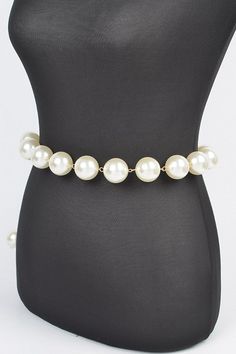 Elevate your outfit with our Iconic Pearl Station Chain Belt. Indulge in the luxury of genuine pearls and a delicate chain, adding a touch of elegance to any look. Complete your wardrobe with this timeless and sophisticated accessory. One Size Width - 1.25" Length - 50" PVC, Faux Pearl, Mix Metal Lead & Nickel Compliant Boutique Homes, Delicate Chain, Chain Belt, Handbag Shoes, Beauty Bar, Mixed Metals, Faux Pearl, Men Dress, Shoe Accessories