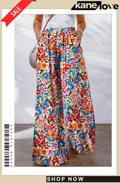 Multicolor Floral Print Pocketed Wide Leg Oversized Pants Casual Multicolor Harem Pants For Spring, Multicolor Summer Pants With Pockets, Casual Multicolor High Waist Wide Leg Pants, Non-stretch Multicolor Wide Leg Pants For Spring, Spring Vacation Wide Leg Pants With Pockets, Wide Leg Pants With Pockets For Spring Vacation, Baggy Wide Leg Pants With Elastic Waistband For Spring, Multicolor Wide Leg Bottoms For Spring, Spring Multicolor Wide Leg Bottoms