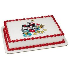 a birthday cake with mickey mouse and friends on it