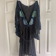 Condition: Excellent; New With Tags Size: M Style: This Can Be Worn As A Beach Cover Up Or Everyday Dress Details: Floral Embroidery; Arms Have Slits Up The Side With A Very Flowing Feel, Tassel Belt Included For Adjustment If Needed. Smoke Free Home Offer Same Day Shipping Feel Free To Reach Each For Any Additional Questions! Black V-neck Boho Dress For Spring, Black Flowy Boho Dress For Festival, Black V-neck Boho Dress For Festival, Rayon V-neck Dress For Festival, Black Long Sleeve Dress For Festival, Black Bohemian V-neck Dress, V-neck Rayon Dress For Festival, V-neck Rayon Boho Dress For Festivals, Black Mini Dress With V-neck For Festival