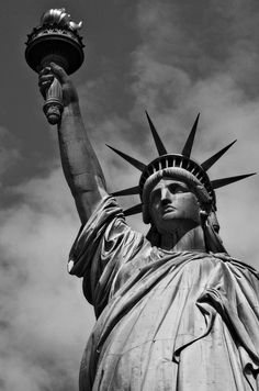 the statue of liberty is shown in black and white