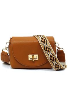 This Bamboo Twist Lock Flap Crossbody Bag features a lock flap design for secure closure. Sturdy material creates a durable and stylish accessory for any outfit. Stay organized and hands-free with this versatile bag. Bamboo Twist Lock Flap Crossbody BagFaux vegan leatherTurn-lock closureGold-tone hardwareDetachable shoulder strap (Guitar strap)L 7 * H 4.8 * W 3 Adjustable Strap Flap Shoulder Bag, Brown Flap Satchel With Fold Over Clasp, Crossbody Saddle Bag With Hasp Closure For Travel, Travel Crossbody Saddle Bag With Hasp Closure, Brown Satchel Flap Bag With Fold Over Clasp, Daily Use Crossbody Satchel With Turn-lock Closure, Crossbody Flap Bag With Removable Pouch As Fashion Accessory, Trendy Shoulder Bag With Fold Over Clasp For Travel, Trendy Travel Shoulder Bag With Fold Over Clasp